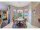 Cozy breakfast nook with views of the pool through a bay window at 13100 Lakewind Dr, Clermont, FL 34711