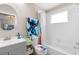 Bathroom featuring tub/shower combo, commode, and vanity at 14421 Vashons Way, Winter Garden, FL 34787