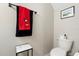 Powder room featuring light gray walls, commode and vanity at 14421 Vashons Way, Winter Garden, FL 34787