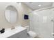 Bathroom featuring glass enclosed shower, vanity and commode at 14421 Vashons Way, Winter Garden, FL 34787