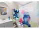 Bathroom featuring tub/shower combo, commode, and vanity at 14421 Vashons Way, Winter Garden, FL 34787
