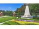 A grand entrance with a monument and well-maintained landscaping welcomes residents and visitors at 14421 Vashons Way, Winter Garden, FL 34787