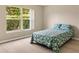 Cozy bedroom with natural light and a comfortable bed at 1514 Vandam St, The Villages, FL 32162