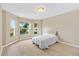 Bright bedroom with large windows and light wood flooring at 1514 Vandam St, The Villages, FL 32162