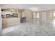 Open-concept living space combines a well-equipped kitchen with a spacious living room at 1514 Vandam St, The Villages, FL 32162