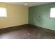 Spacious bedroom with painted walls and hardwood floors and natural light at 15587 Se 150Th Ave, Weirsdale, FL 32195