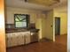 Kitchen space with white cabinets and stainless-steel appliances, offering room for customization at 15587 Se 150Th Ave, Weirsdale, FL 32195