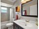 Updated bathroom with a shower-tub combo, a modern vanity, and stylish fixtures at 15837 Hidden Lake Cir, Clermont, FL 34711