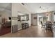 Bright dining area features tile floors, a sliding glass door to the yard, and stylish pendant lighting at 15837 Hidden Lake Cir, Clermont, FL 34711