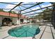 Backyard pool with screened enclosure and plenty of seating areas for outdoor enjoyment at 15837 Hidden Lake Cir, Clermont, FL 34711