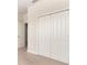 Bedroom with a closet with bi-fold doors and carpeting at 17112 Goldcrest Loop, Clermont, FL 34714