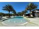 Community pool with fountains and lounge chairs at 17112 Goldcrest Loop, Clermont, FL 34714