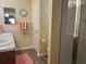 Bright bathroom with double sinks, updated fixtures, and glass shower, providing a luxurious feel at 1723 Banberry Run, The Villages, FL 32162