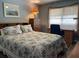 Bright bedroom with a large window and desk at 1723 Banberry Run, The Villages, FL 32162