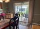 Dining room featuring a sliding door leading to the outdoor patio area at 1723 Banberry Run, The Villages, FL 32162