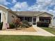 Charming single-story home with landscaped front yard and inviting walkway at 1723 Banberry Run, The Villages, FL 32162
