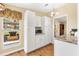 A bright, efficient kitchen, showcasing ample white cabinets, modern appliances, and natural lighting at 1726 W Schwartz Blvd, Lady Lake, FL 32159