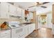 Well-equipped kitchen featuring modern appliances and abundant cabinet space at 1726 W Schwartz Blvd, Lady Lake, FL 32159