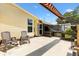 Outdoor patio featuring an awning perfect for relaxing and entertaining at 1726 W Schwartz Blvd, Lady Lake, FL 32159