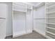 Large walk-in closet with ample shelving and hanging space at 185 Hamlet Loop, Davenport, FL 33837