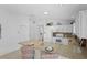 Well-appointed kitchen featuring modern appliances and granite countertops at 1963 Ladyfish Ave, The Villages, FL 32162