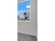 A view from inside the bedroom to the neighborhood beyond at 2025 Axel St, Minneola, FL 34715