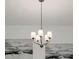 Contemporary chandelier adds elegance to this home, enhancing the room's ambiance at 2025 Axel St, Minneola, FL 34715