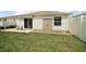 Well-kept backyard with a small storage shed for outdoor equipment and tools at 2050 Duval Ct, The Villages, FL 32162