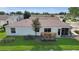 Aerial backyard view highlighting landscape at 2111 Thornton Ter, The Villages, FL 32162