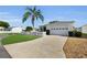 Well-maintained home featuring manicured lawn and driveway at 2111 Thornton Ter, The Villages, FL 32162