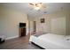 Bedroom showcasing white walls and light colored flooring with a ceiling fan for comfortable living at 21206 Canoe Pass St, Clermont, FL 34715