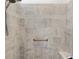 Walk-in shower with gray tile, a built-in bench, and a shower head at 2321 Demarco Dr, The Villages, FL 32163