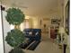 Spacious living area offering a seamless transition to the dining room, perfect for modern living at 2388 Branchville Ter, The Villages, FL 32162