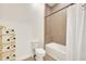 Bathroom featuring a combination of ceramic tile finishes and a separate shower and bathtub at 2666 Meadowedge Loop, St Cloud, FL 34772