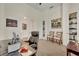 A cozy and functional office featuring carpeted floors, soft lighting, and a large desk at 2666 Meadowedge Loop, St Cloud, FL 34772