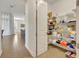 Spacious walk-in pantry with ample shelving for organized storage and accessibility at 2666 Meadowedge Loop, St Cloud, FL 34772