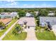 Charming single-story home with well-kept landscaping, a spacious driveway, and an inviting entrance at 27018 Nature View St, Leesburg, FL 34748
