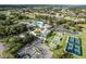 Aerial view of community center, tennis, shuffleboard and pool at 27018 Nature View St, Leesburg, FL 34748