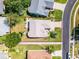 Well-situated property featuring a pristine layout and an inviting curb appeal with lush landscaping at 27018 Nature View St, Leesburg, FL 34748
