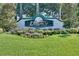 Manicured community sign for Legacy of Leesburg in a beautiful landscape at 27018 Nature View St, Leesburg, FL 34748