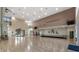 Spacious hall with high ceilings and hardwood floors, ideal for events at 27018 Nature View St, Leesburg, FL 34748