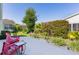 Relaxing backyard setting with chairs, manicured landscaping and gravel beds at 2785 Privada Dr, The Villages, FL 32162