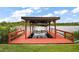 Covered boat lift on the water's edge, providing easy access for boating at 31941 Tropical Shores Dr, Tavares, FL 32778