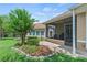 Nice backyard with enclosed patio, landscaping, and privacy at 3257 Baltic Sea Blvd, Tavares, FL 32778