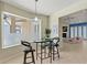Bright breakfast nook offers extra seating, and backyard views at 3257 Baltic Sea Blvd, Tavares, FL 32778