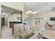 Open-concept dining area connects to the kitchen and living room, promoting an airy feel at 3257 Baltic Sea Blvd, Tavares, FL 32778