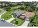 Beautiful single-story homes featuring mature landscaping and manicured lawns on a quiet street at 3257 Baltic Sea Blvd, Tavares, FL 32778