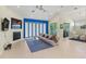 Living area with fireplace, recessed lights, and sliding glass doors to an outdoor patio at 3257 Baltic Sea Blvd, Tavares, FL 32778