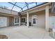Large screened patio with lots of room for entertaining and outdoor living at 3257 Baltic Sea Blvd, Tavares, FL 32778