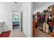 Walk-in closet and view of bedroom offering ample storage space with natural light at 33960 Sky Blossom Cir, Leesburg, FL 34788